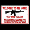 Welcome To My Home That Door You Kicked In Was Locked For Your Protection Not Mine Sign