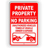 PRIVATE PROPERTY NO PARKING UNAUTHORIZED VEHICLES TOWED AT OWNER'S EXPENSE