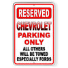 CHEVROLET PARKING ONLY ALL OTHERS WILL BE TOWED ESPECIALLY FORDS METAL SIGN