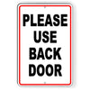 PLEASE USE BACK DOOR METAL SIGN