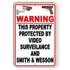 This Property Is Protected By Video Surveillance And S&W
