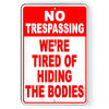 No Trespassing We're Tired Of Hiding The Bodies Metal Sign NT18