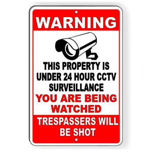 THIS PROPERTY IS UNDER 24 HOUR CCTV SURVEILLANCE YOU ARE BEING WATCHED TRESPASSERS WILL BE SHOT