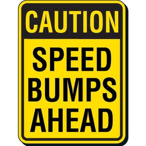 Caution Speed Bumps Ahead Sign