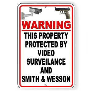 This Property Is Protected By Video Surveillance And S&W